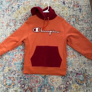Orange size small sweatshirt with red velvet details